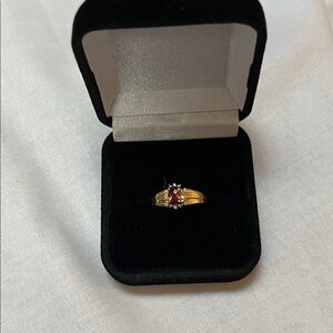 Gold Ring with Red Gemstone